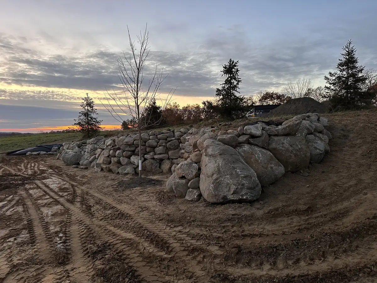 Boulder retaining wall construction in Oakland County