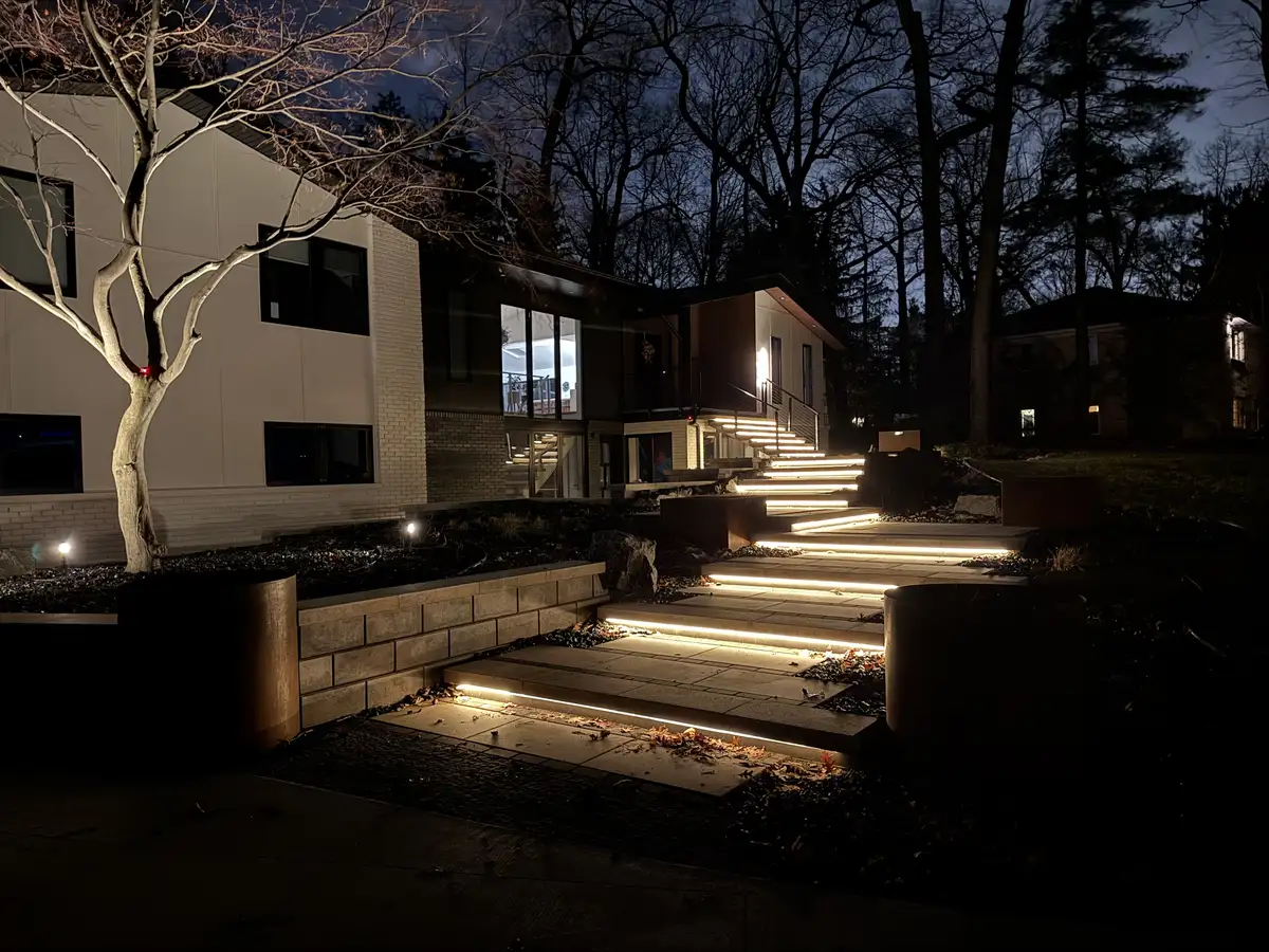 LED step lighting on paver stairs in an outdoor living space