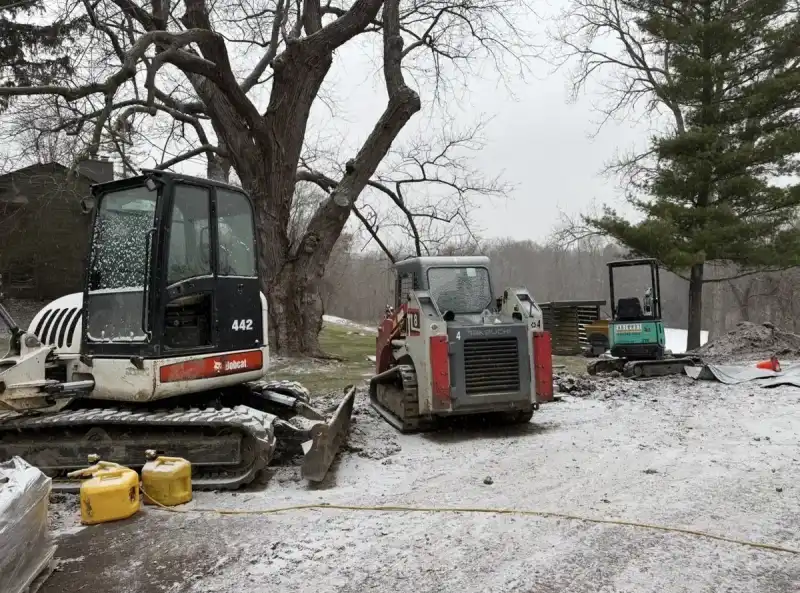 Landscaping equipment on trailer — Earth Art fleet